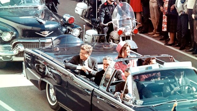 JFK Revisited: Through the Looking Glass C More